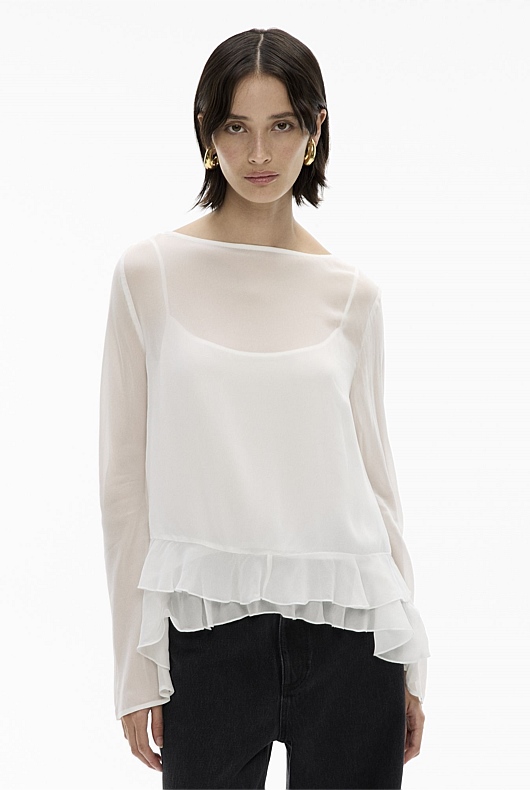 white ruffle hem top